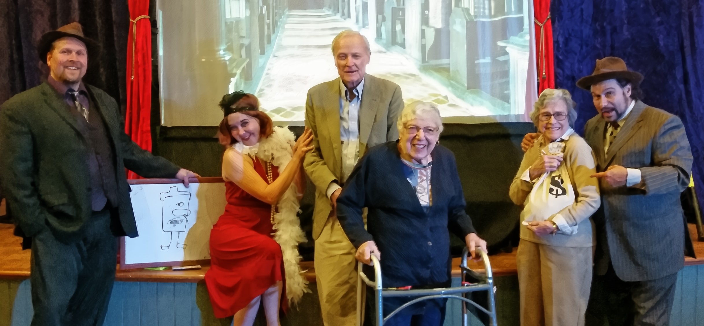 Flapper-themed Roaring 20s entertainment for senior community – Riddlesbrood actor and guests in period costumes